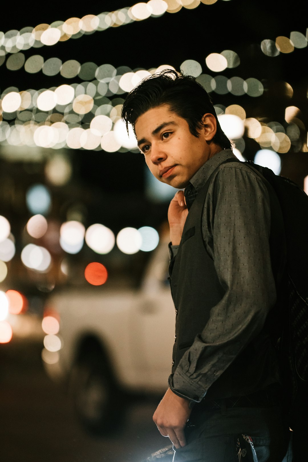 man in black hoodie standing