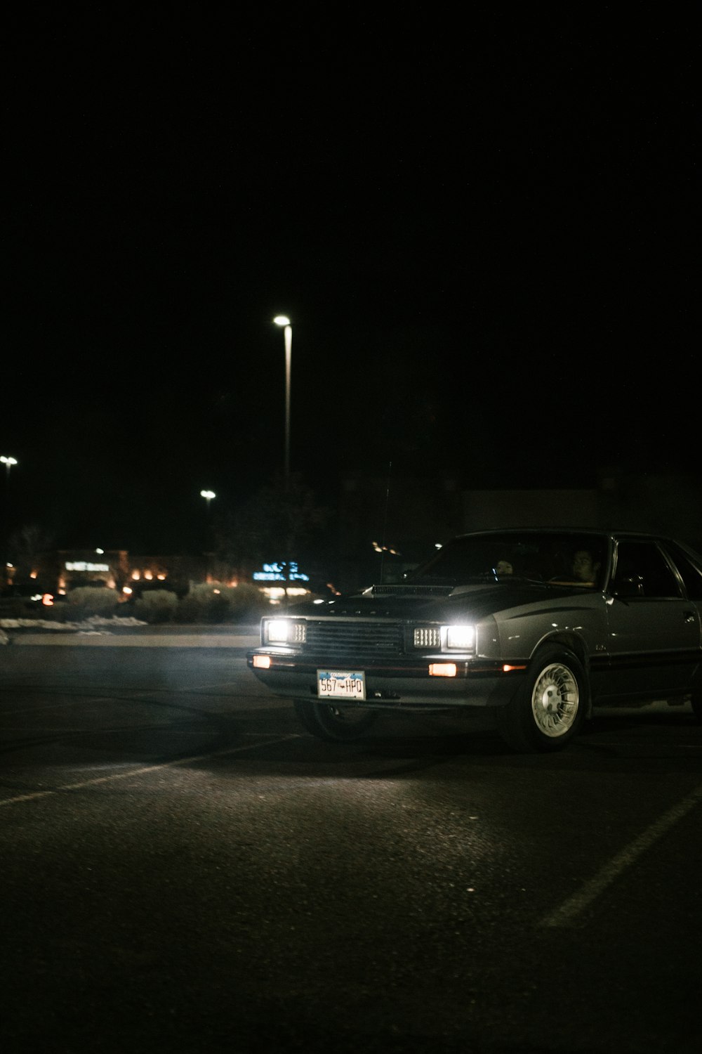 black chevrolet car on road during night time