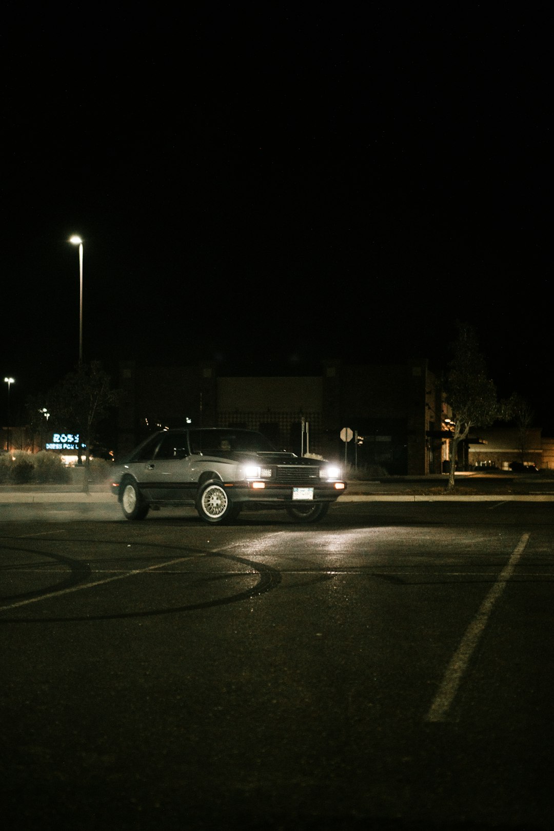 white suv on road during night time