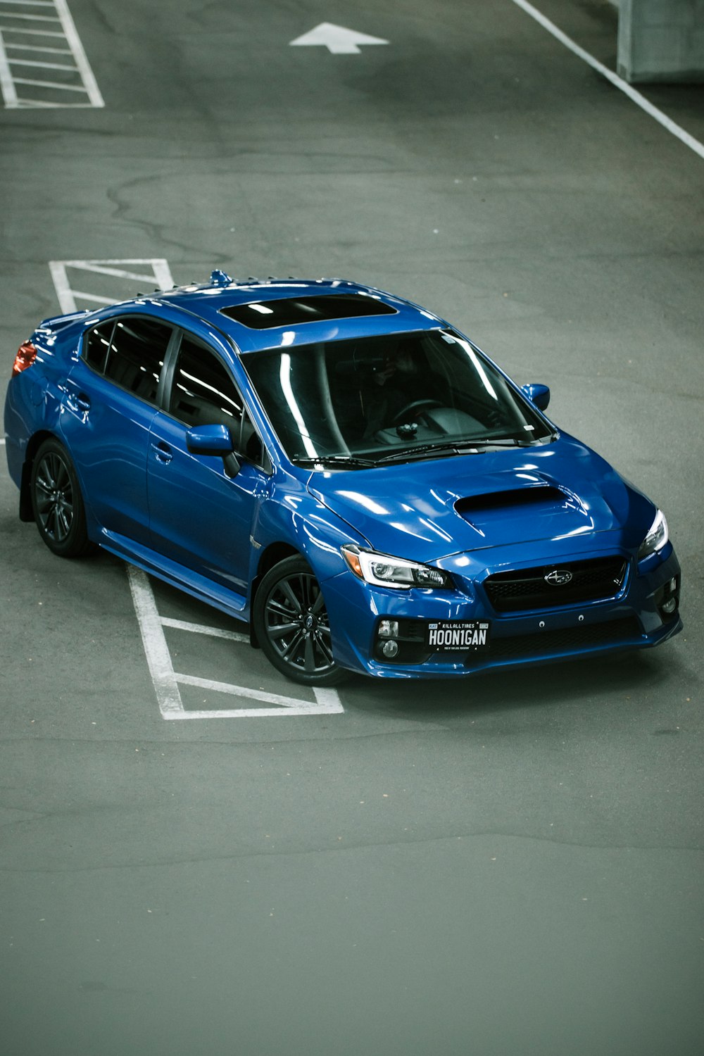 blue honda sedan on road during daytime