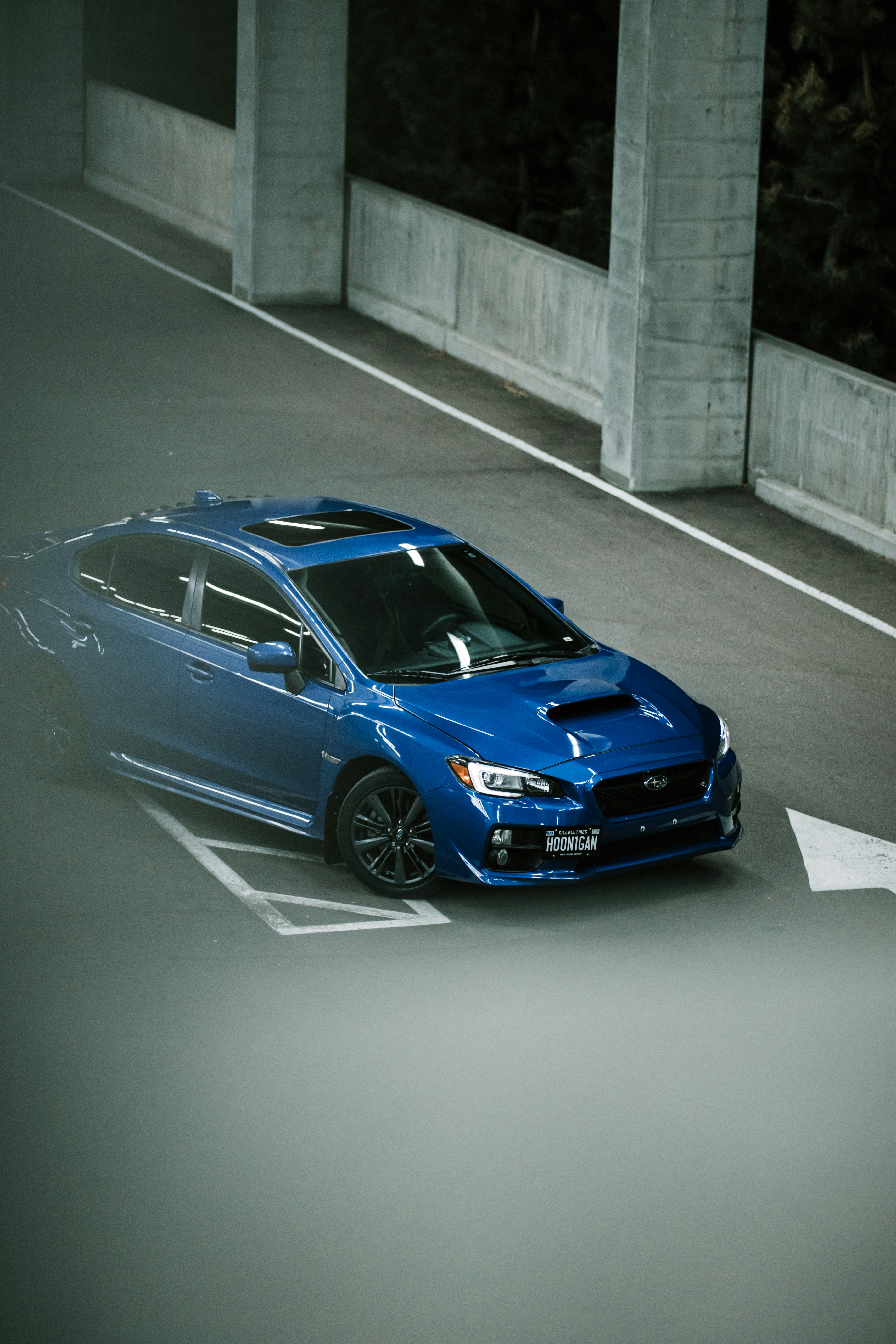 blue bmw m 3 coupe parked on road during daytime