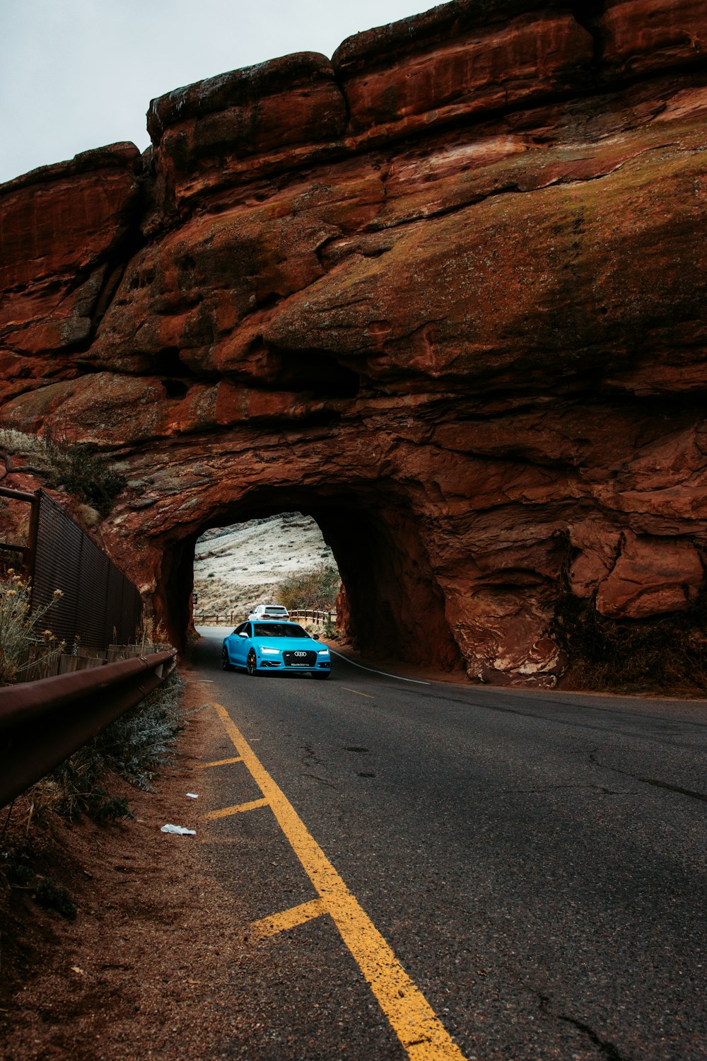 blue car on road during daytime