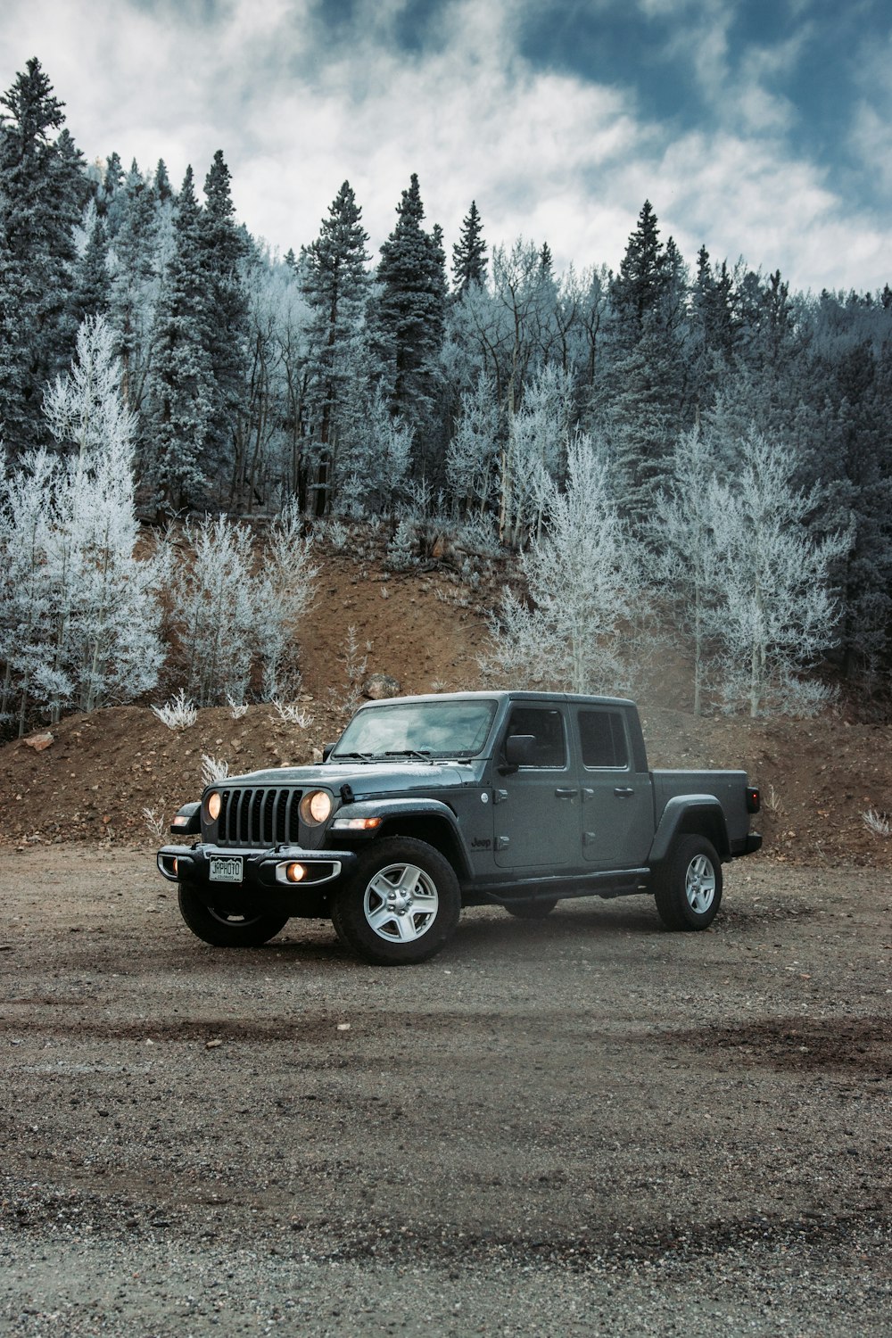 black jeep wrangler on brown dirt road during daytime