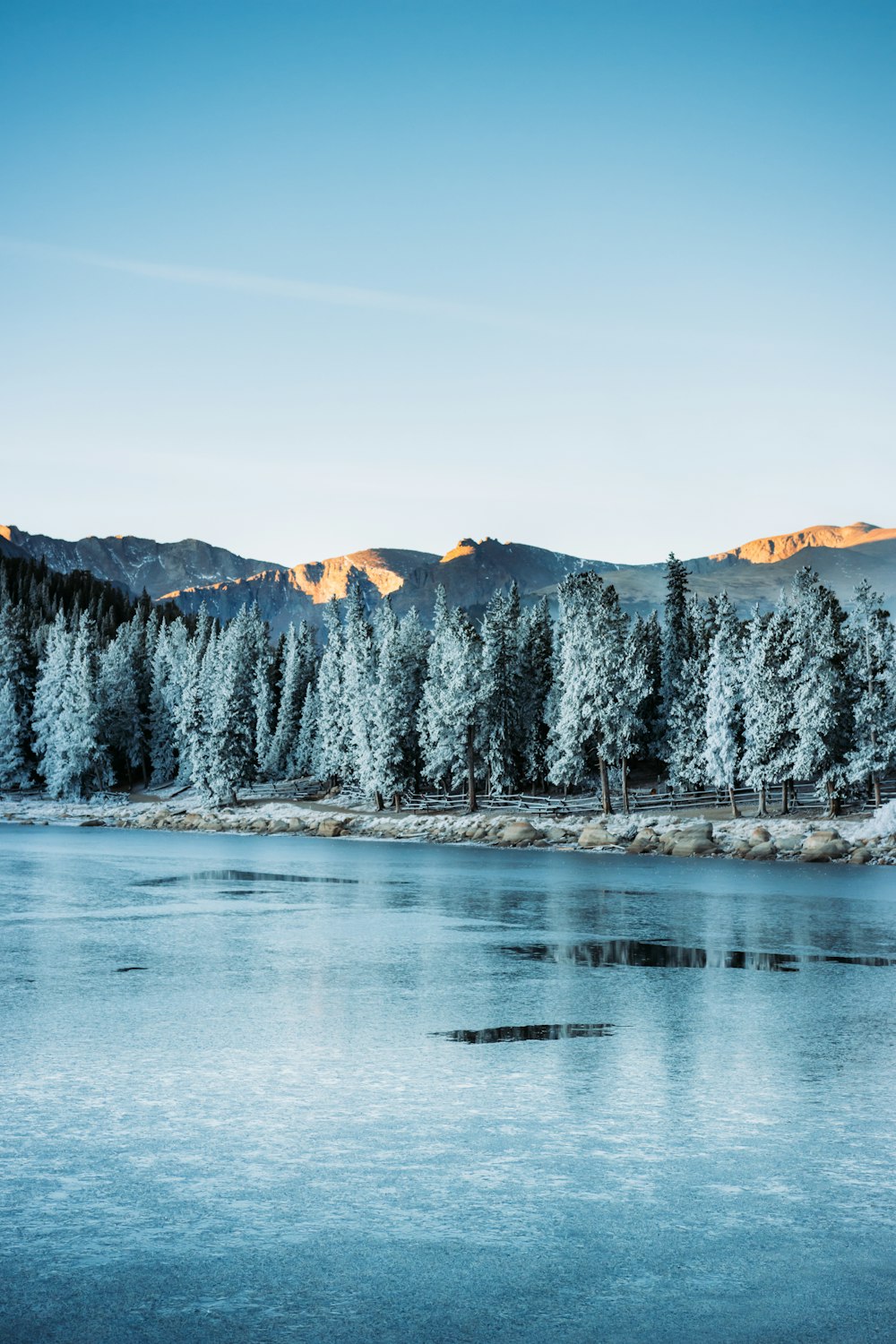 snow covered mountain during daytime