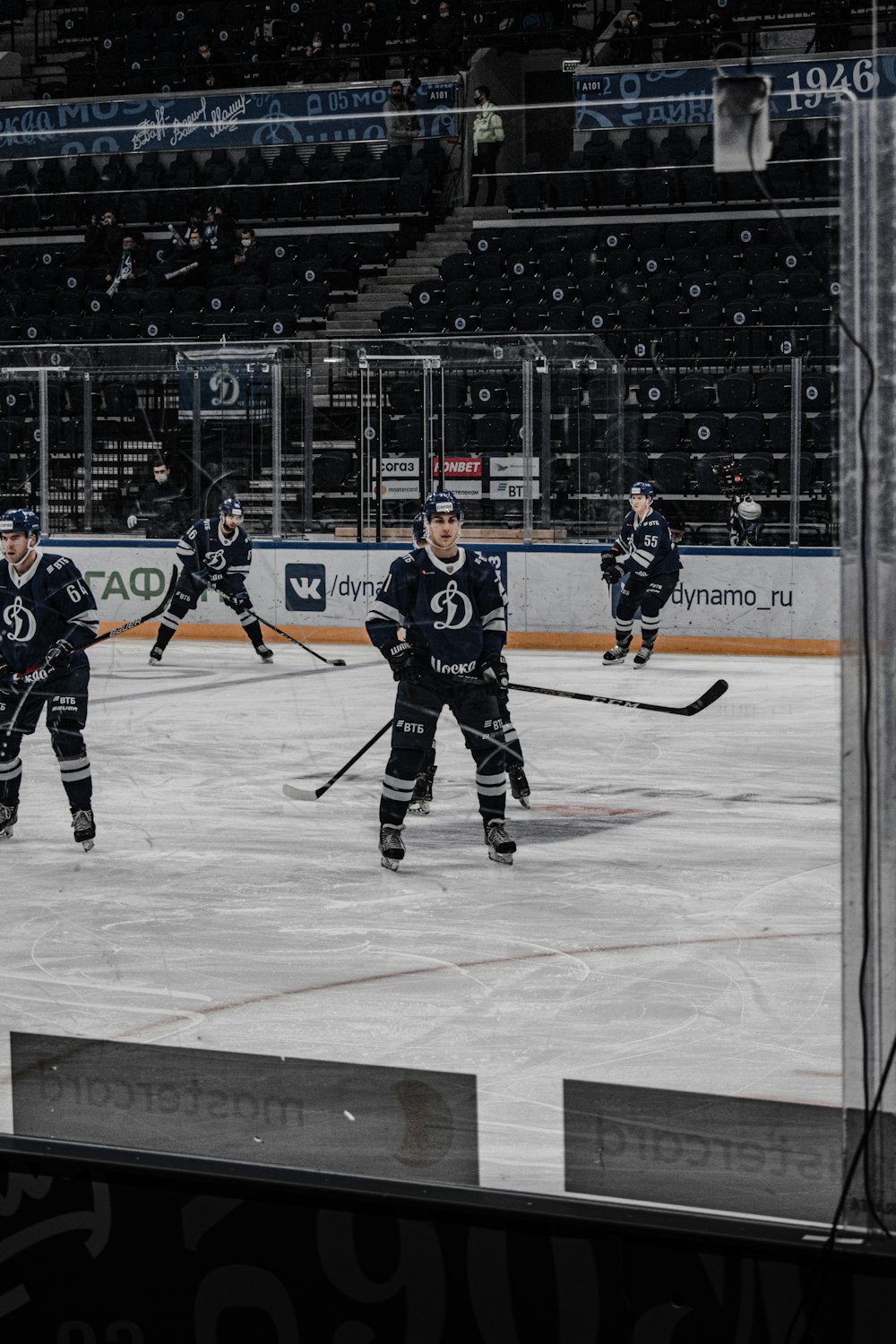 ice hockey players on ice hockey field