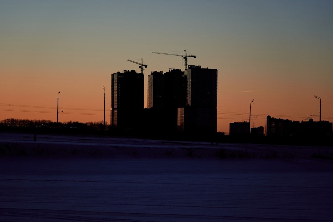 silhouette of building during sunset