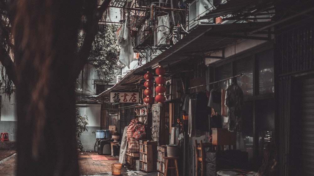 red paper lanterns on street during daytime