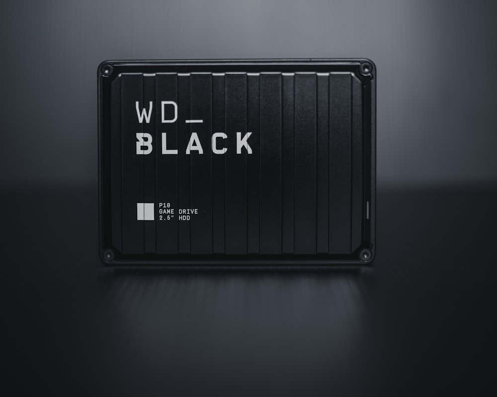 a black and white sign that says w d black