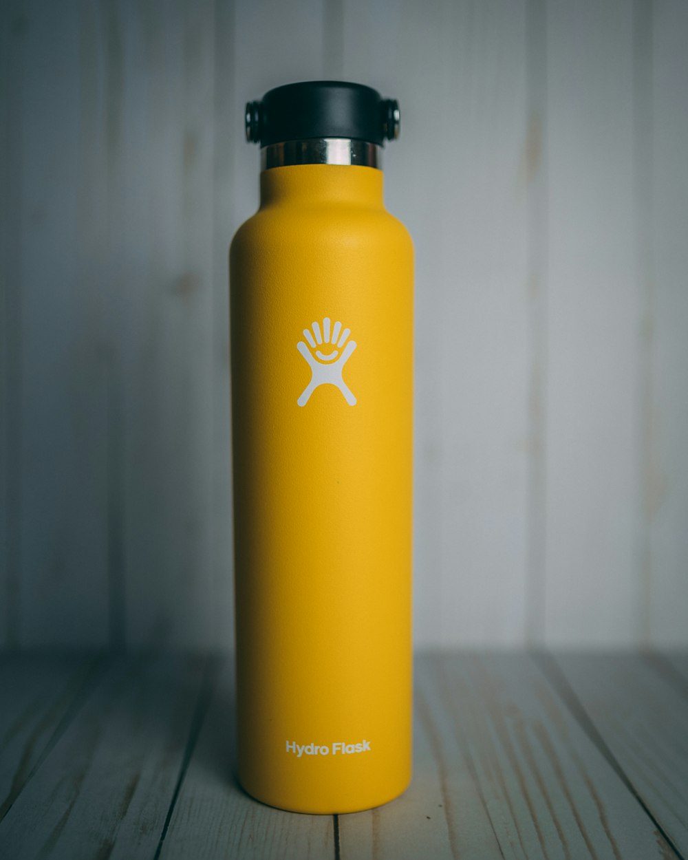 yellow and black sports bottle