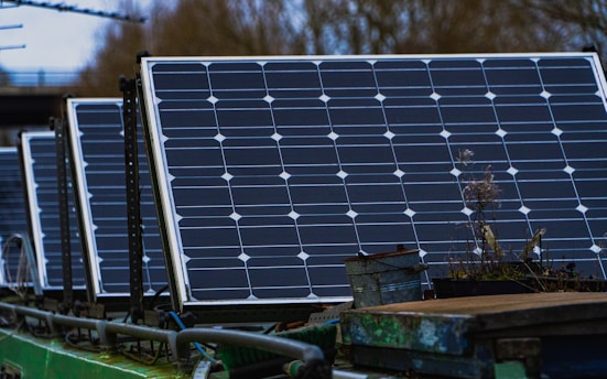blue solar panels on brown wooden bench