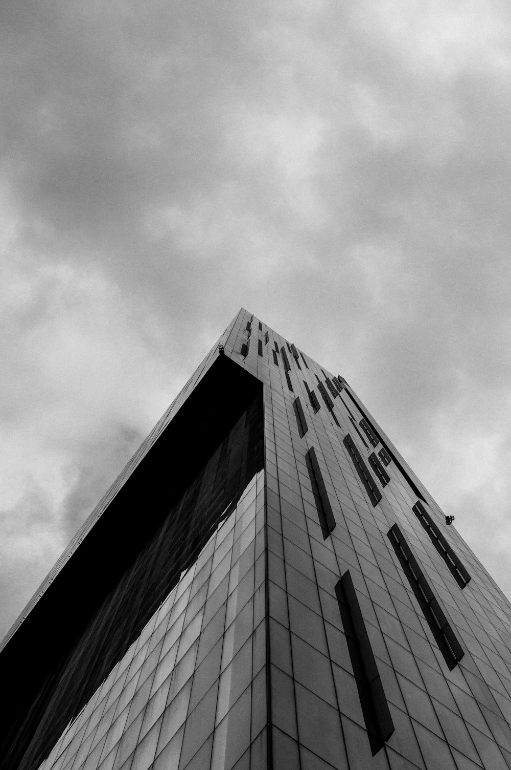 grayscale photo of concrete building