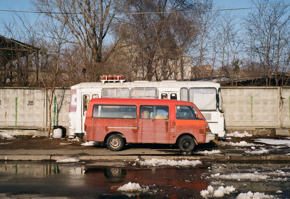 an old van is parked on the side of the road