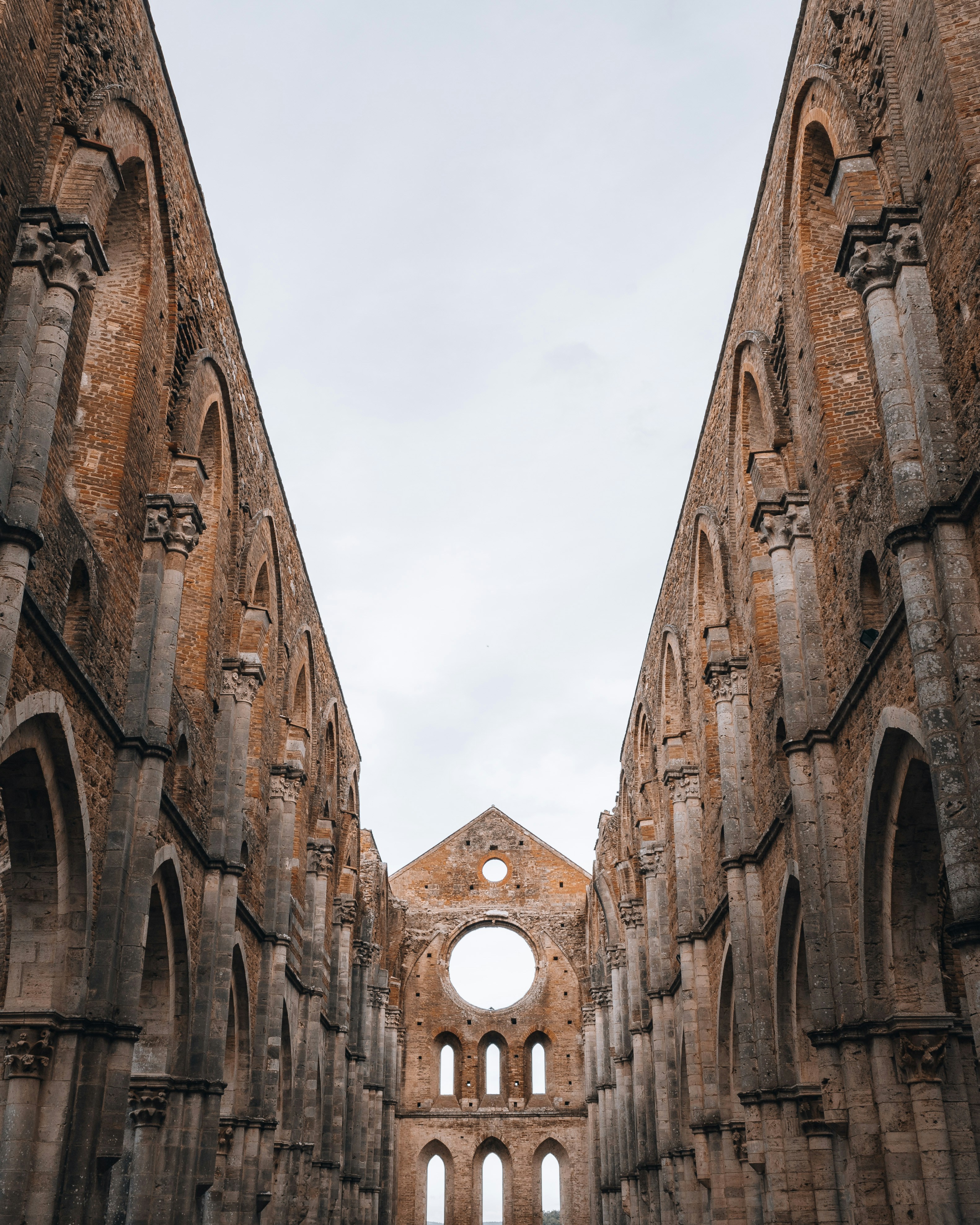 brown concrete building under white sky during daytime