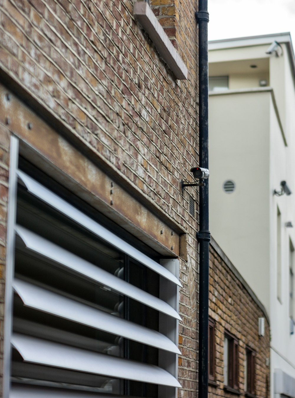 brown brick wall during daytime