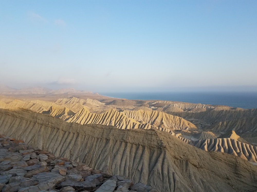 brown mountains under blue sky during daytime