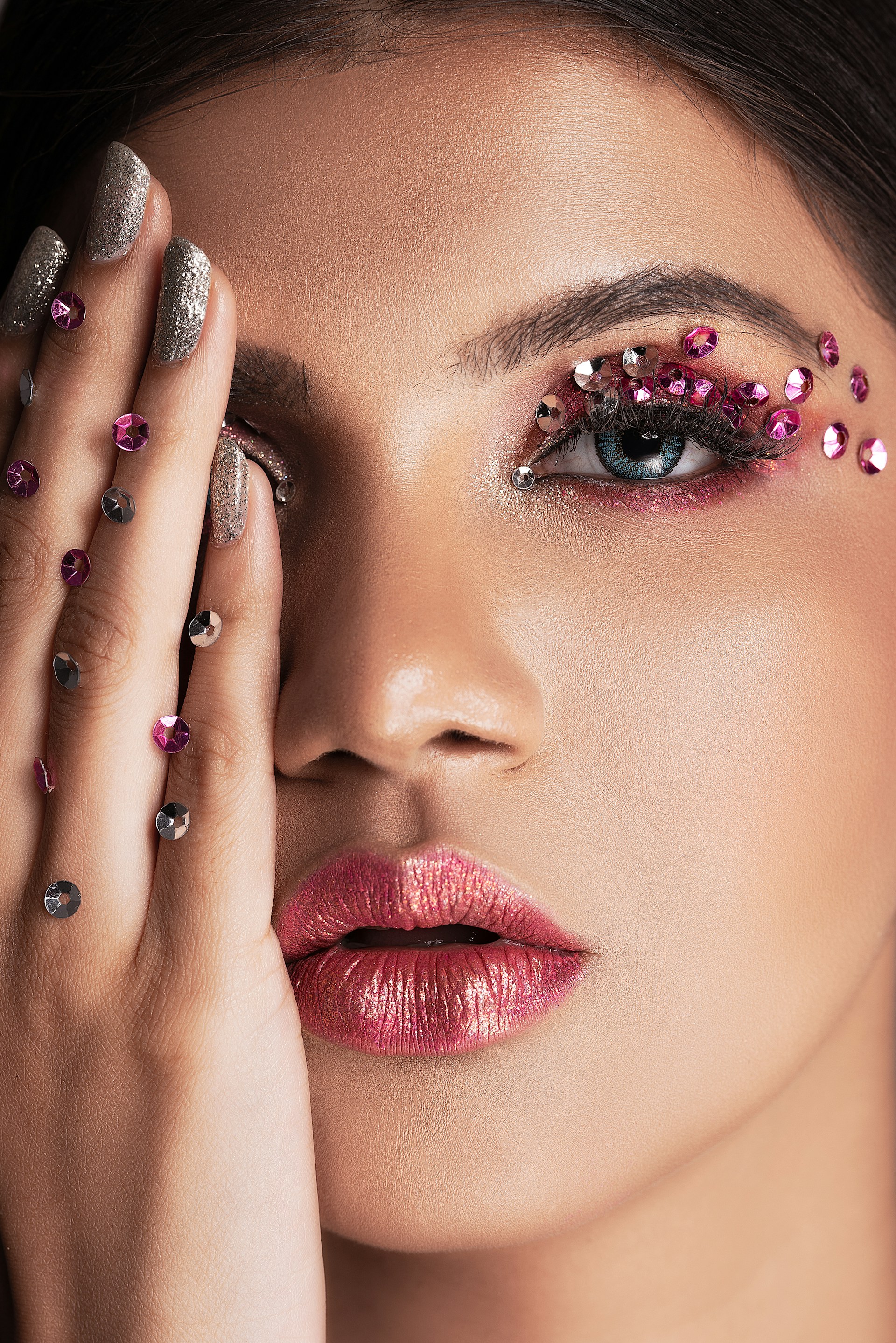 woman with red lipstick and black eyeshadow