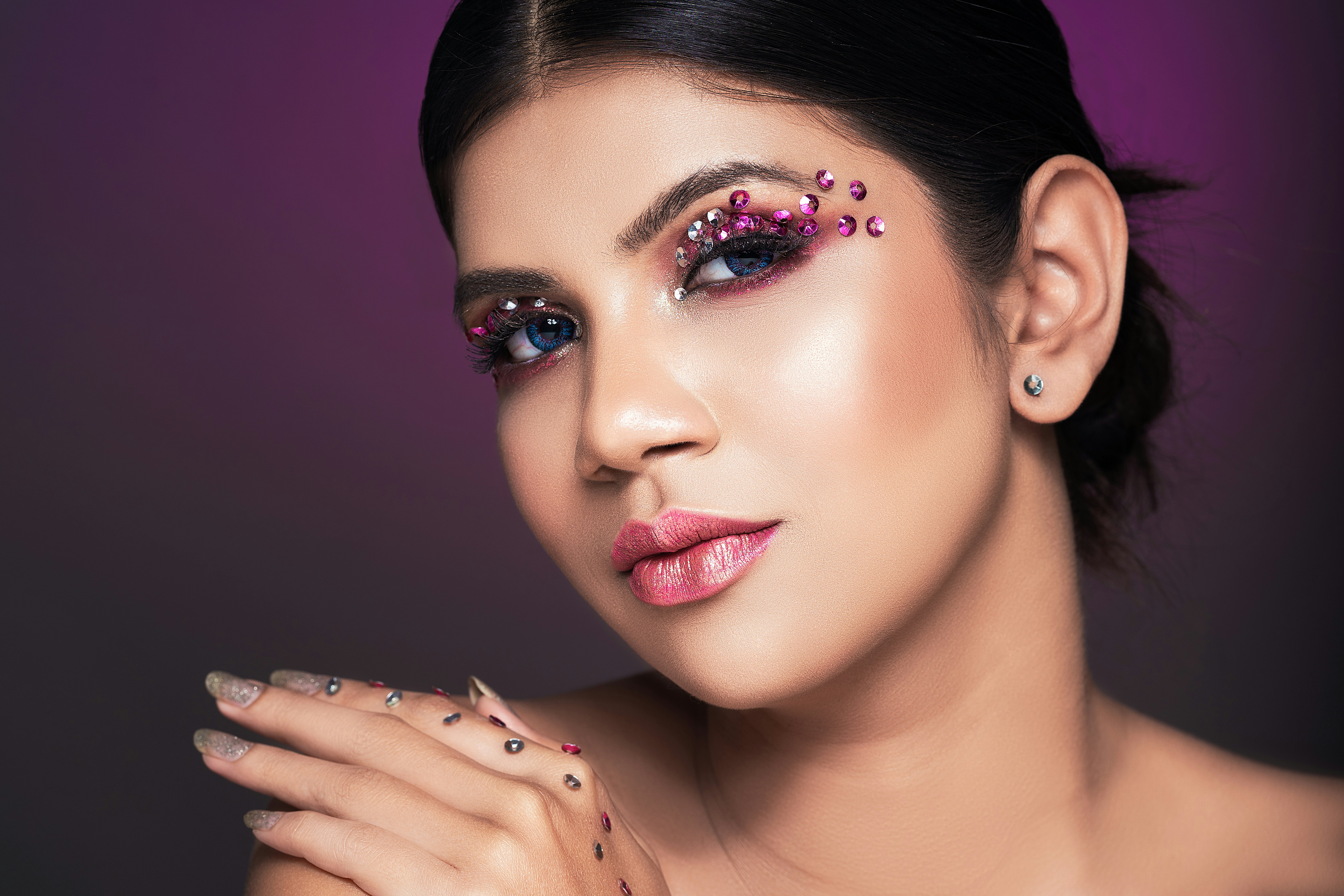 woman with red lipstick and black mascara