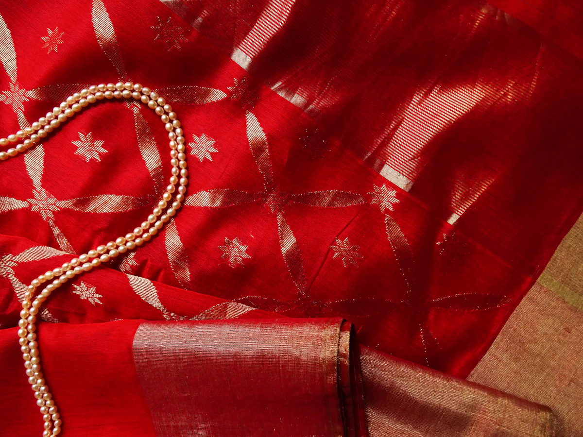 Red Banarasi silk with pearls in the Verrelle atelier