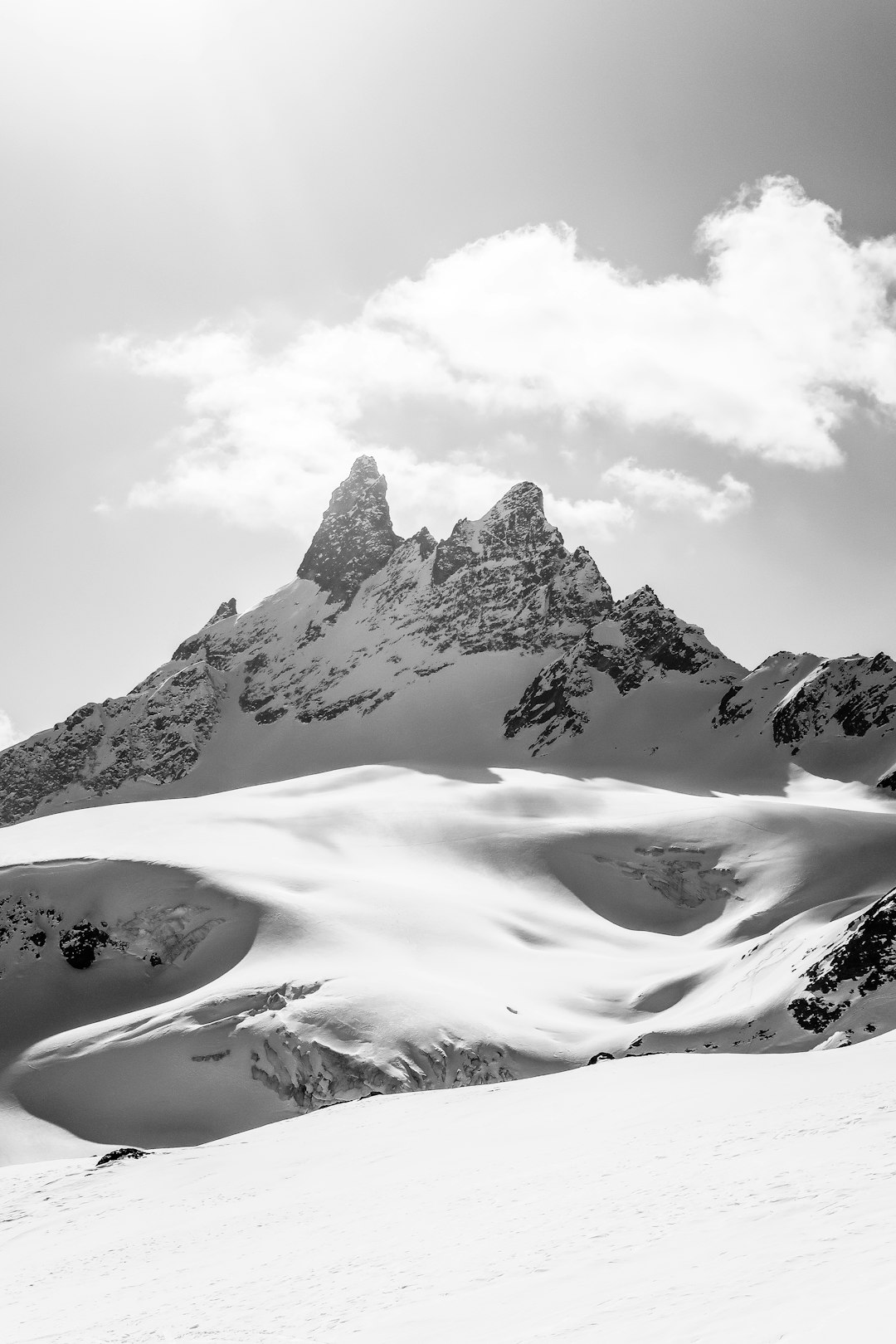 grayscale photo of snow covered mountain