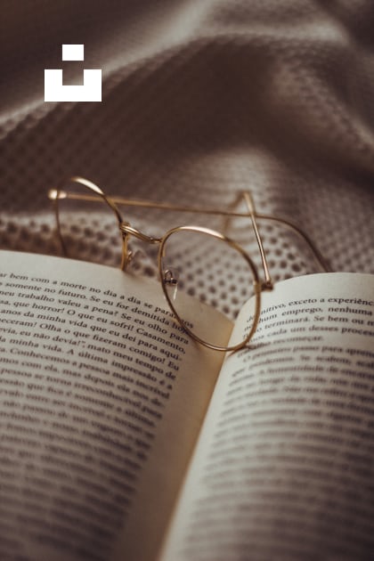 gold framed eyeglasses on book page photo – Free Grey Image on Unsplash