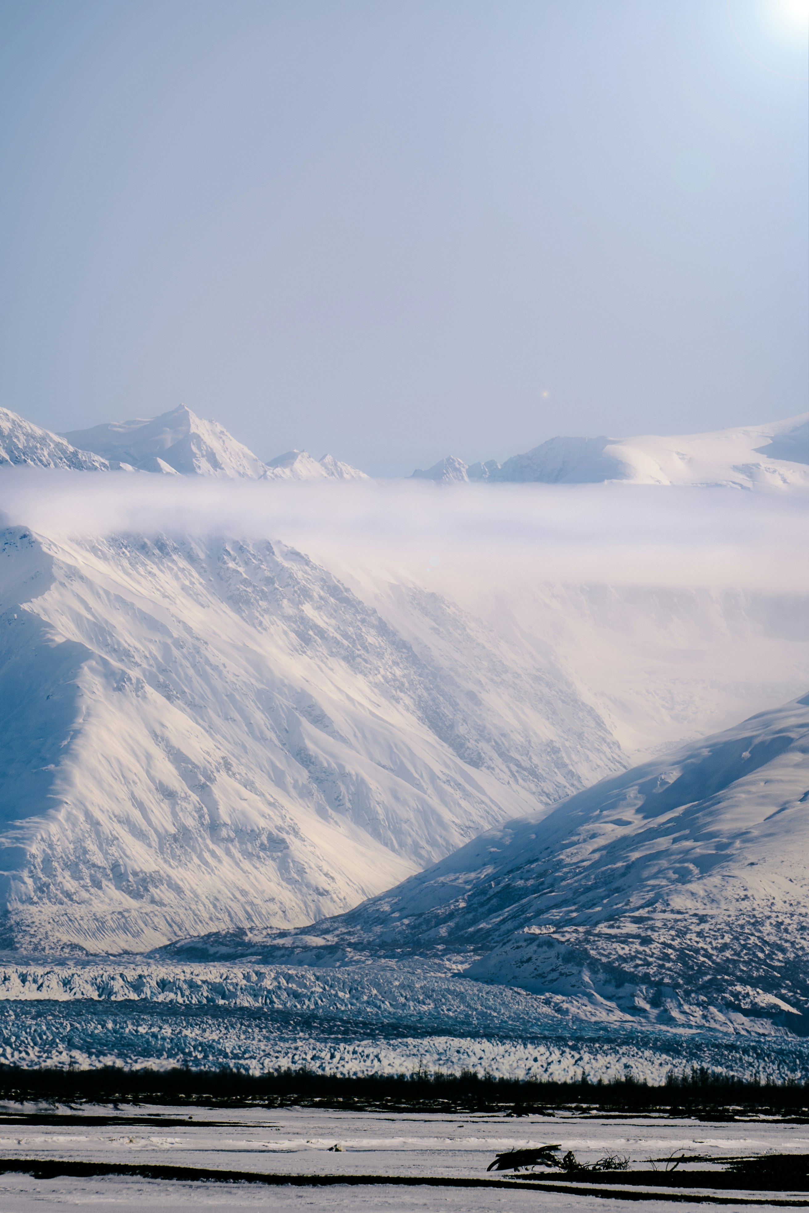 snow covered mountains during daytime