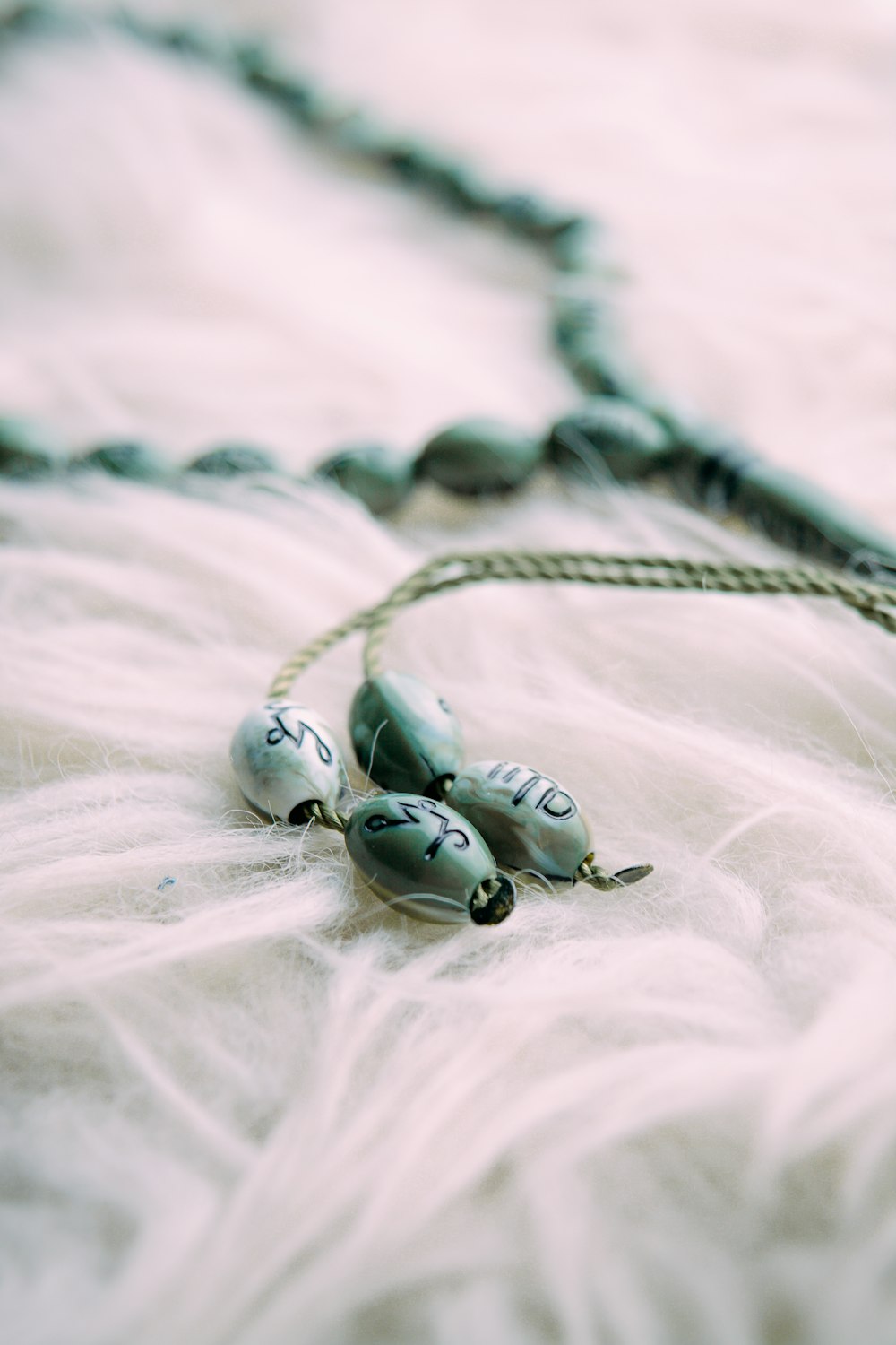 white and black ladybug pendant necklace