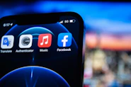 black smartphone showing 9 00