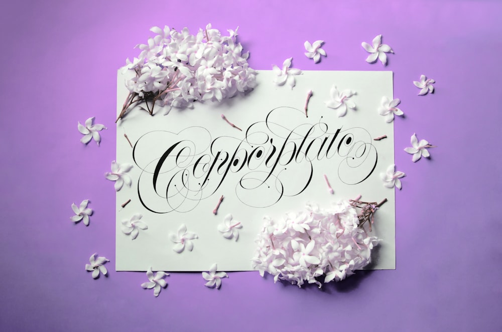 happy birthday greeting card on purple surface
