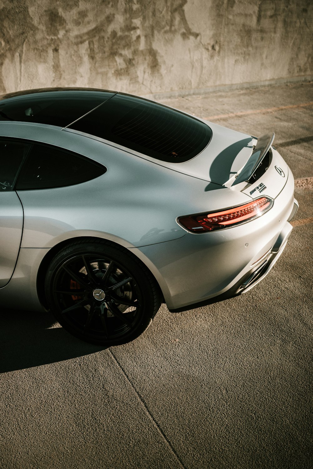 silver porsche 911 on road