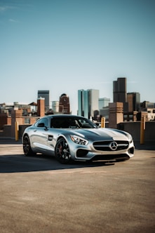 white bmw m 3 coupe parked on road during daytime