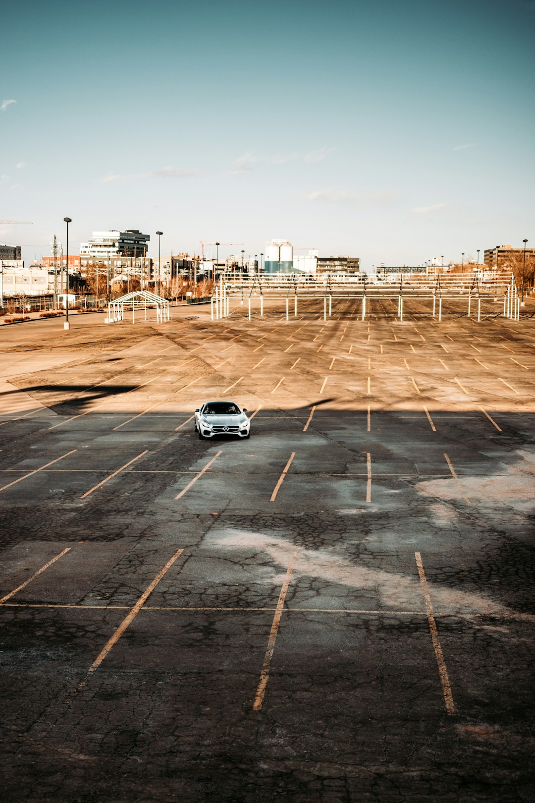 silver car on gray asphalt road during daytime