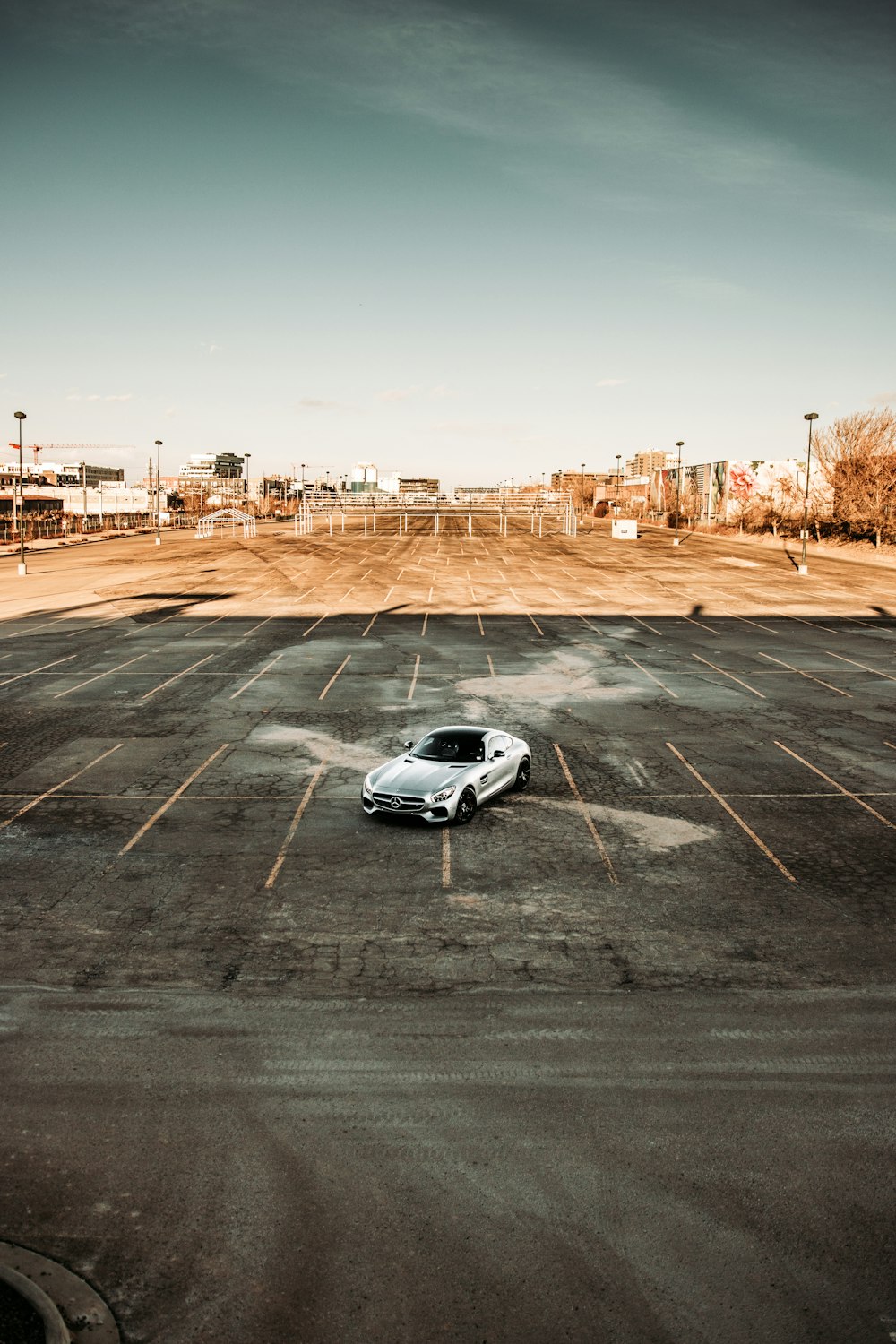 white and black porsche 911 on road during daytime