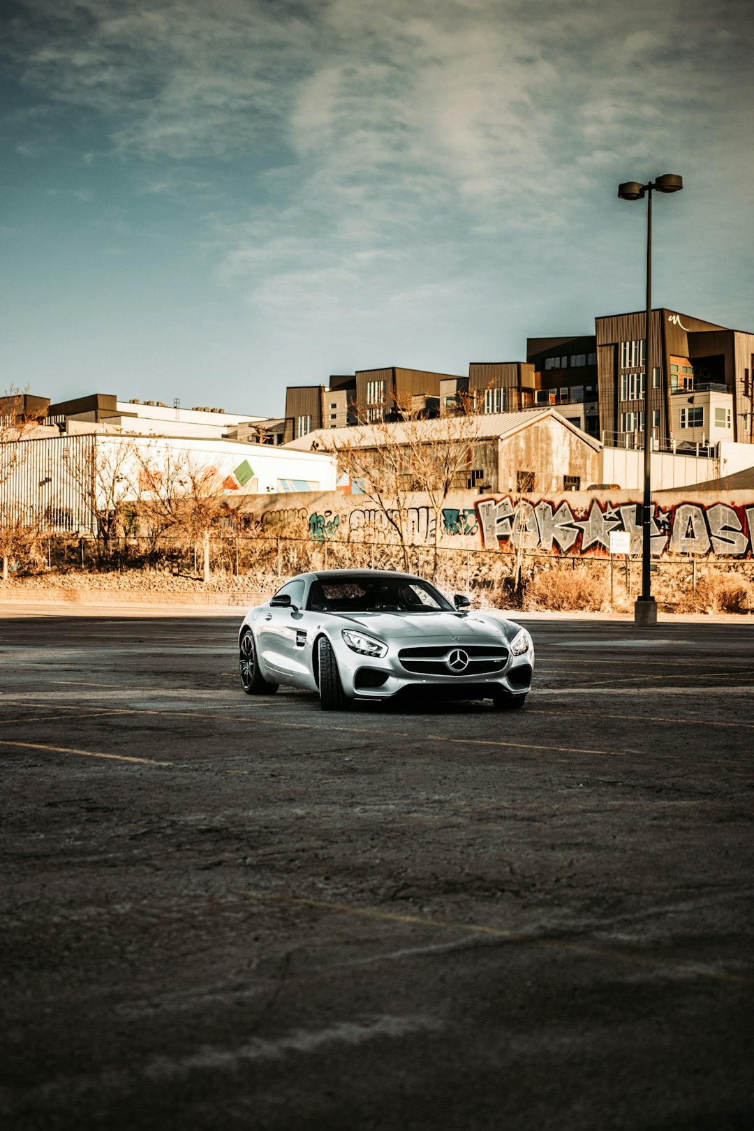 white coupe on road during daytime