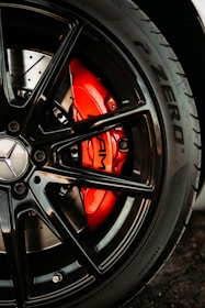 black and red car wheel