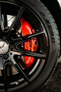 black and red car wheel