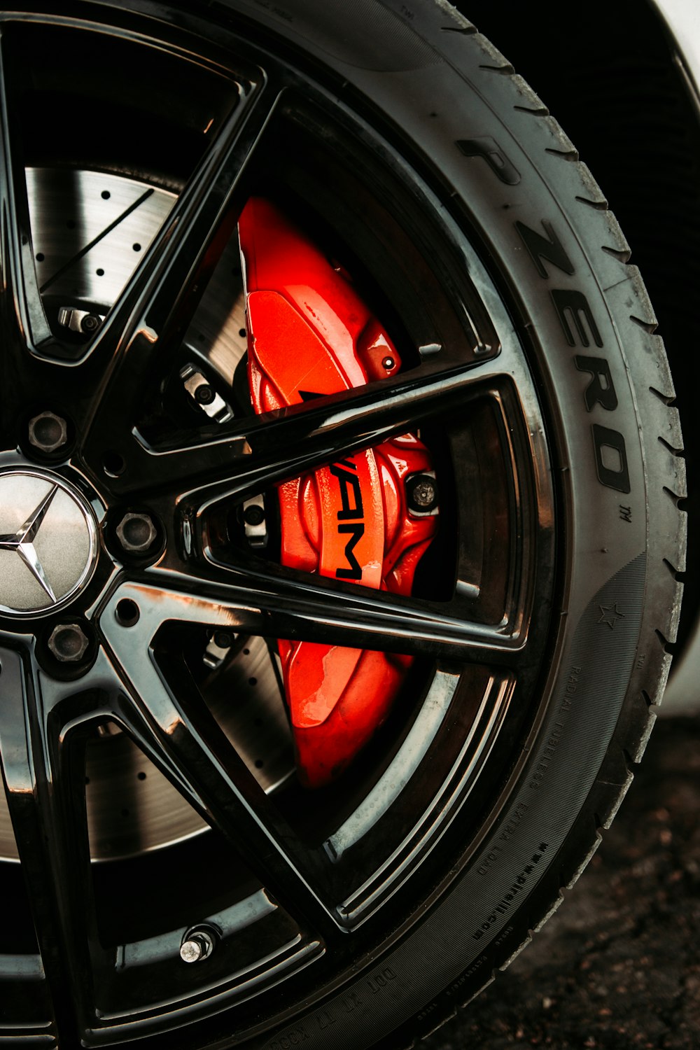 black and red car wheel