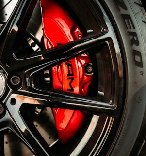 black and red car wheel