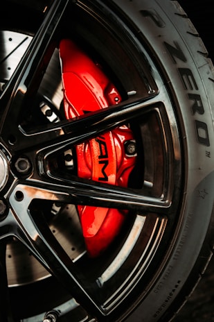 black and red car wheel