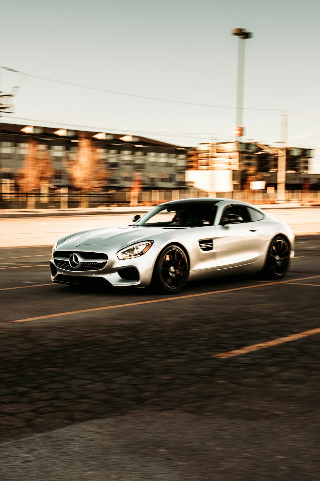 white mercedes benz coupe on road during daytime