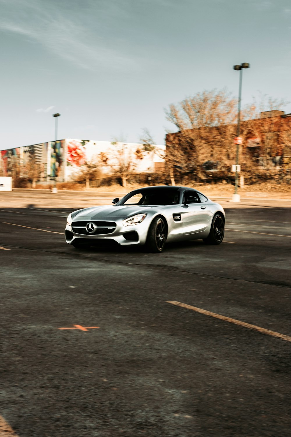 white and black bmw m 3 coupe on road during daytime