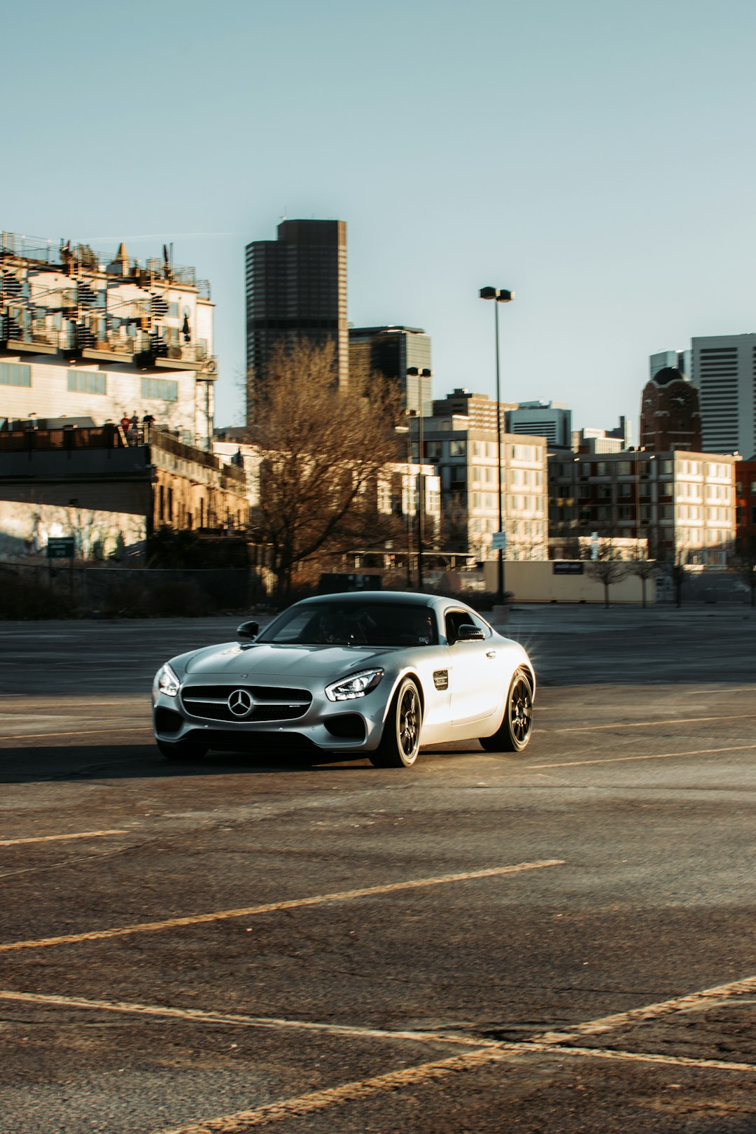 white mercedes benz coupe on road during daytime