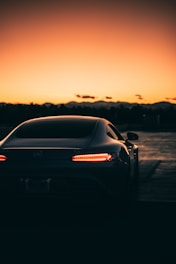black honda car on road during sunset
