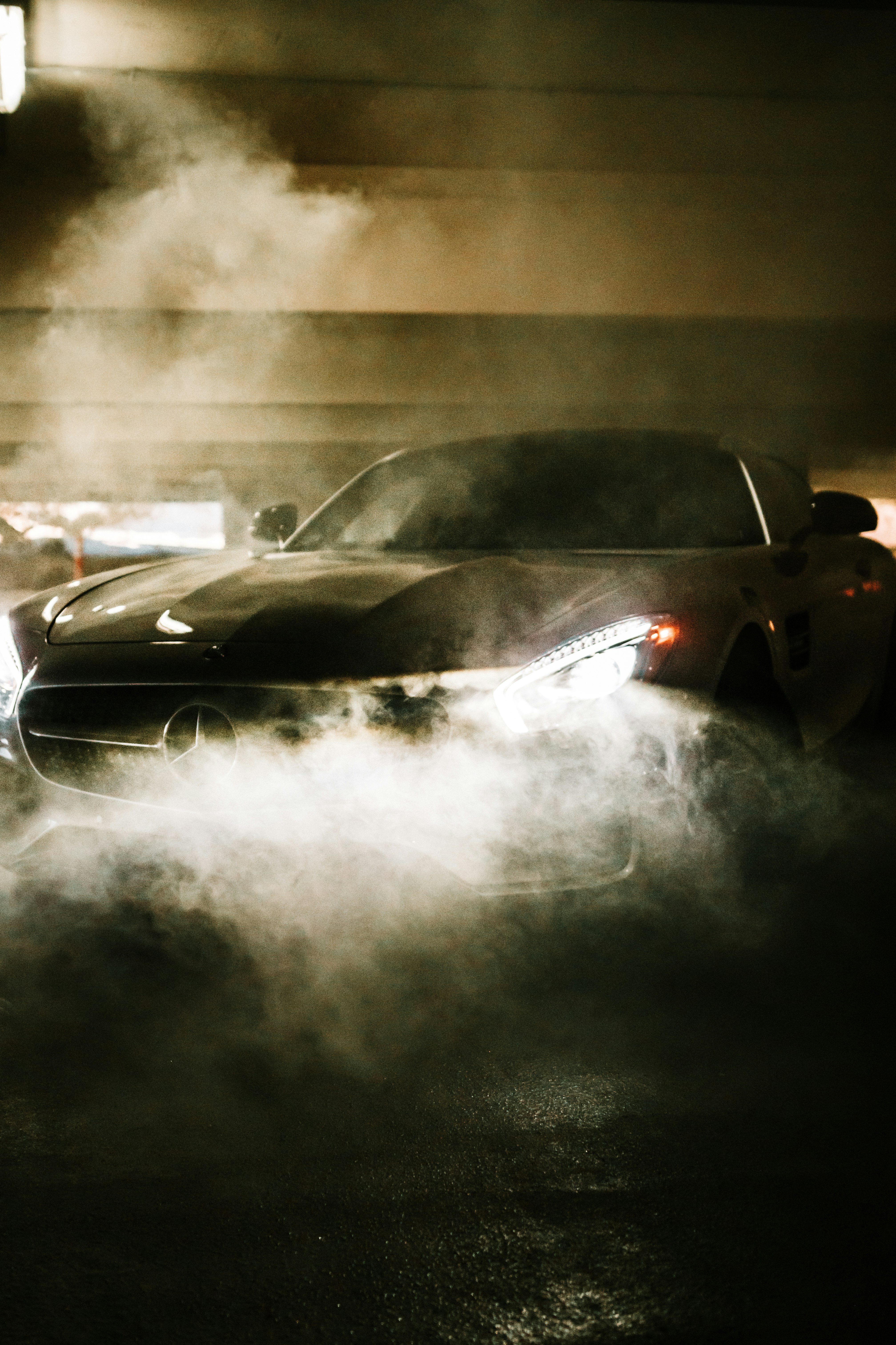 black lamborghini aventador on gray asphalt road