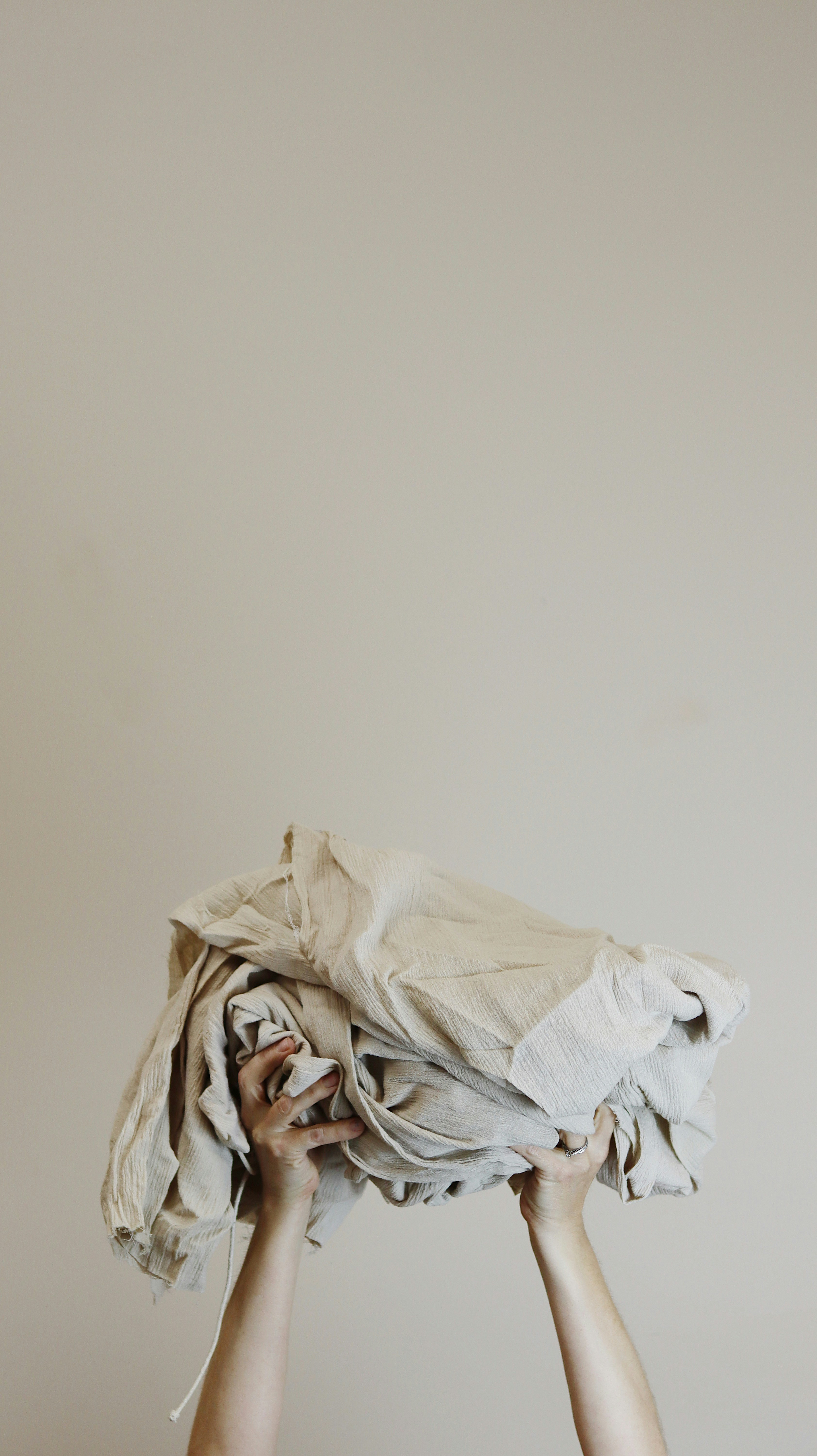 white textile on white table
