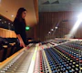Joan Juncosa working passionately at the mixing console surrounded by modernist decor.