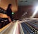 A satisfied customer working on a mixing console.