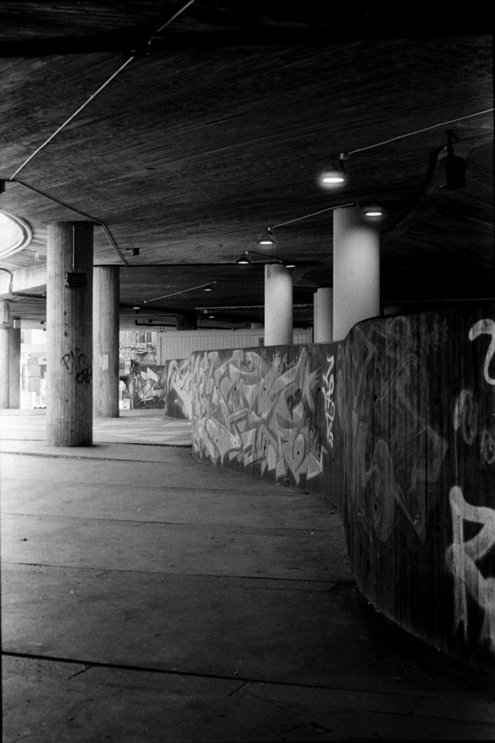 grayscale photo of concrete pillar