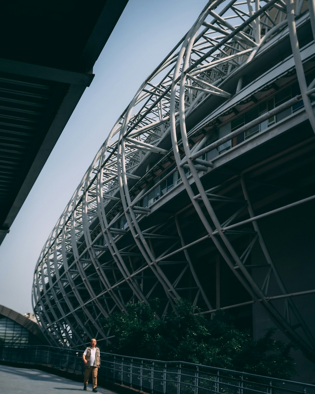 people walking on white metal bridge during night time