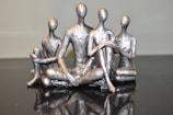 gray and black ceramic figurine