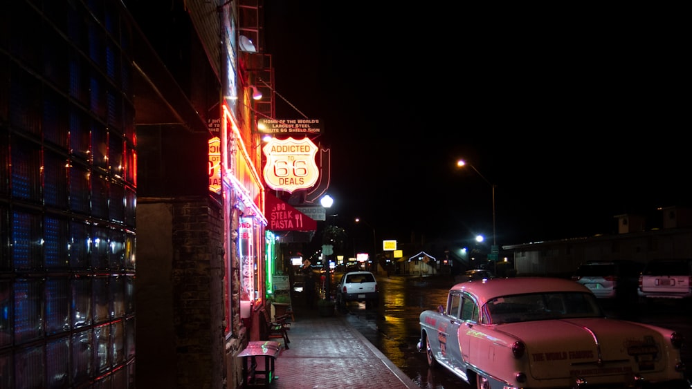 cars parked on street during night time